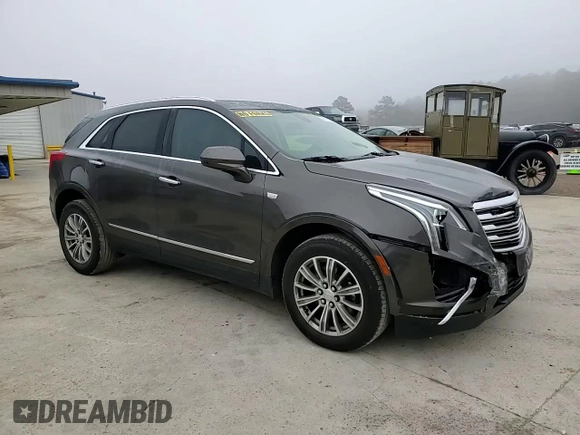 2019 Cadillac XT5 Luxury FWD with VIN 1GYKNCRSXKZ141831, listed as a Copart auction lot 43758765 with 97,402 mi miles and Salvage Title. Bid and sale history available at DreamBid. Image 11.
