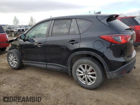 2016 Mazda CX-5 Touring with VIN JM3KE4CY8G0610653, listed as a Copart auction lot 53390375 with 125,142 mi miles and Salvage Title. Bid and sale history available at carsss.com. Image 2.