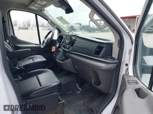 2021 Ford Transit Cargo with VIN 1FTBR1Y84MKA41093, listed as a IAAI auction lot 41799933 with 59,088 mi miles and . Bid and sale history available at DreamBid. Image 5.