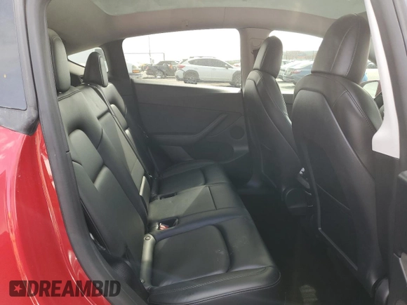 2021 Tesla Model Y Long Range with VIN 5YJYGDEEXMF217816, listed as a Copart auction lot 51008665 with 57,392 mi miles and Salvage Title. Bid and sale history available at DreamBid. Image 11.