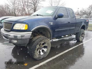 2003 Ford F-150 XL with VIN 1FTRX18L73NA26027, listed as a IAAI auction lot 41843867 with 1 mi miles. Bid and sale history available at carsss.com. Image 2.