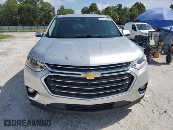 2019 Chevrolet Traverse LT Cloth z VIN 1GNERGKW8KJ320242, wystawiony jako Copart lot #60324095 z przebiegiem 103 680 mil mil oraz Szkoda całkowita • Salvage title. Historia ofert i sprzedaży dostępna na DreamBid. Obrazek 5.