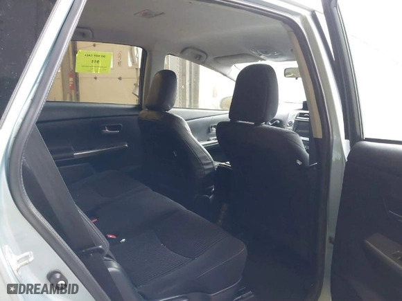 2015 Toyota Prius v Two with VIN JTDZN3EU3FJ030358, listed as a IAAI auction lot 41675153 with 149,482 mi miles. Bid and sale history available at carsss.com. Image 8.
