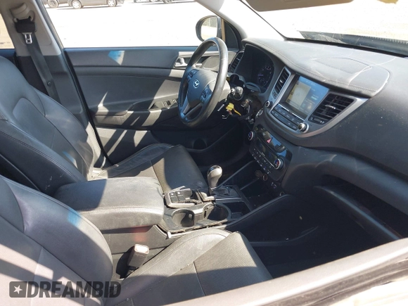 2016 Hyundai Tucson Limited with VIN KM8J33A26GU137391, listed as a IAAI auction lot 42088662 with 72,048 mi miles. Bid and sale history available at carsss.com. Image 5.