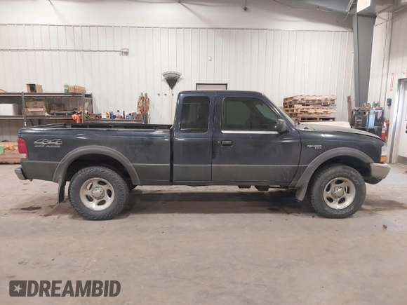 2000 Ford Ranger XLT with VIN 1FTZR15X2YPB86720, listed as a IAAI auction lot 41501141 with 211,794 mi miles. Bid and sale history available at carsss.com. Image 13.