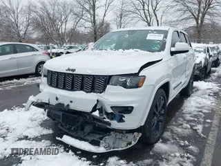 2017 Jeep Grand Cherokee Laredo with VIN 1C4RJFAG2HC951071, listed as a IAAI auction lot 41536568 with 99,941 mi miles. Bid and sale history available at carsss.com. Image 2.