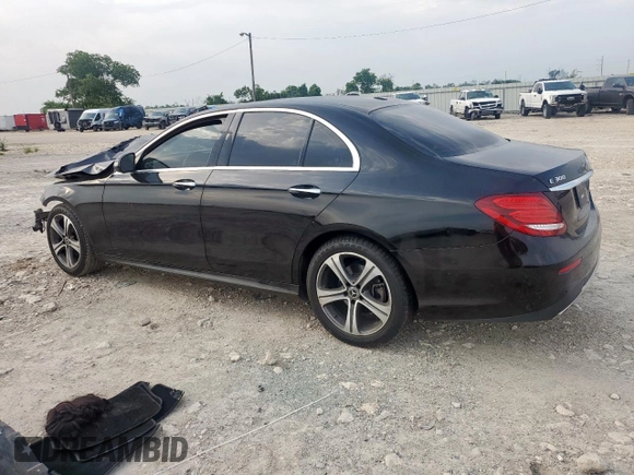 2019 Mercedes-Benz E 300 with VIN WDDZF4JB2KA618999, listed as a Copart auction lot 56915465 with 64,077 mi miles and Salvage title. Bid and sale history available at DreamBid. Image 2.