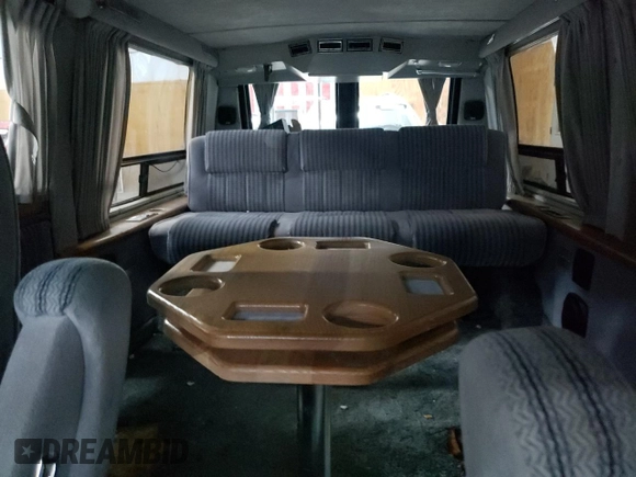 1988 Chevrolet Chevy Van z VIN 2GBEG25K2J4137750, wystawiony jako Copart lot #89310475 z przebiegiem 26 823 mil mil oraz Szkoda całkowita • Salvage title. Historia ofert i sprzedaży dostępna na DreamBid. Obrazek 10.