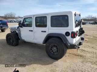 2023 Jeep Wrangler Sport S with VIN 1C4HJXDGXPW665818, listed as a Copart auction lot 48357105 with 9,803 mi miles and Clean Title. Bid and sale history available at DreamBid. Image 2.