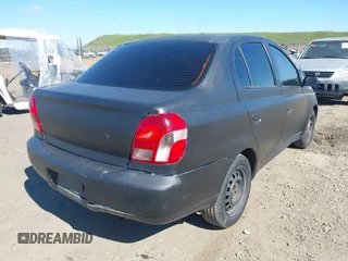 2002 Toyota ECHO with VIN JTDBT123120243848, listed as a IAAI auction lot 41677515 with 287,759 mi miles. Bid and sale history available at carsss.com. Image 4.