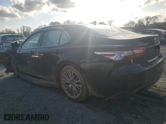 2019 Toyota Camry Hybrid LE z VIN 4T1B21HK2KU519539, wystawiony jako Copart lot #51830045 z przebiegiem Nie podano mil oraz Szkoda całkowita • Salvage title. Historia ofert i sprzedaży dostępna na DreamBid. Obrazek 2.
