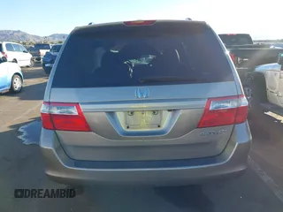 2005 Honda Odyssey EX-L with VIN 5FNRL38755B063203, listed as a IAAI auction lot 41073372 with Not provided miles and . Bid and sale history available at DreamBid. Image 16.