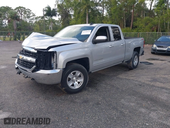 2019 Chevrolet Silverado 1500 LT with VIN 2GCVKPECXK1158607, listed as a IAAI auction lot 41116624 with 72,822 mi miles and . Bid and sale history available at DreamBid. Image 2.