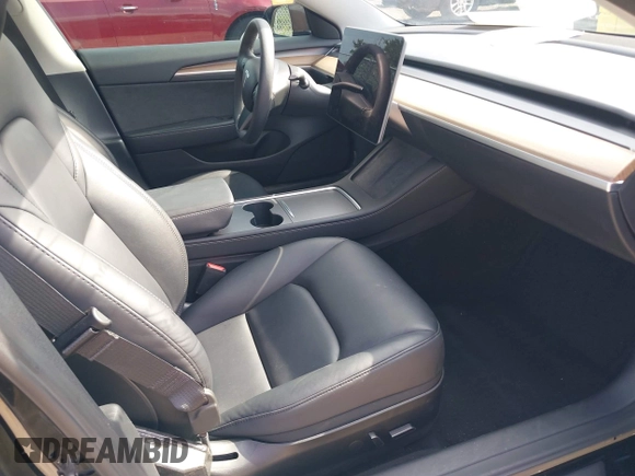 2023 Tesla Model 3 с VIN 5YJ3E1EA0PF589066, выставлен на аукционе IAAI как лот 42508495 с пробегом Не указан миль и . История ставок и продаж доступна на DreamBid. Изображение 5.
