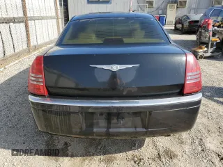2005 Chrysler 300 C z VIN 2C3JA63H55H520689, wystawiony jako Copart lot #58623655 z przebiegiem 92 513 mil mil oraz Czysty tytuł • Clean title. Historia ofert i sprzedaży dostępna na DreamBid. Obrazek 6.