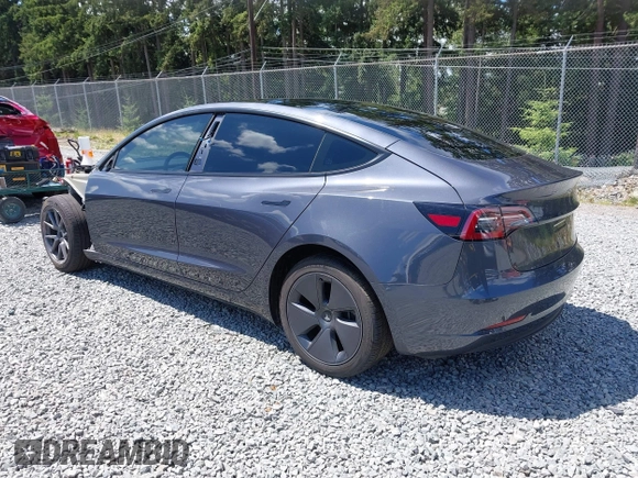 2023 Tesla Model 3 z VIN 5YJ3E1EA6PF650212, wystawiony jako IAAI lot #42554747 z przebiegiem 49 838 mil mil oraz . Historia ofert i sprzedaży dostępna na DreamBid. Obrazek 3.