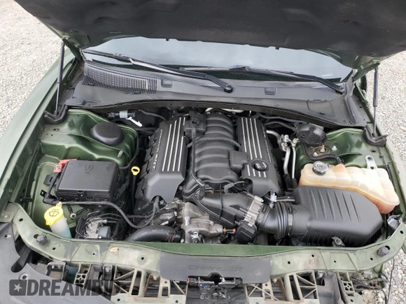 2019 Dodge Charger Scat Pack z VIN 2C3CDXGJ9KH593210, wystawiony jako Copart lot #56586775 z przebiegiem 73 405 mil mil oraz Szkoda całkowita • Salvage title. Historia ofert i sprzedaży dostępna na DreamBid. Obrazek 11.