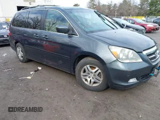 2005 Honda Odyssey EX-L with VIN 5FNRL38645B008281, listed as a IAAI auction lot 41985052 with 219,693 mi miles. Bid and sale history available at carsss.com. Image 1.