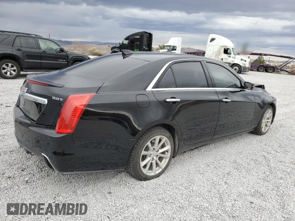 2017 Cadillac CTS AWD with VIN 1G6AW5SX5H0188734, listed as a Copart auction lot 82203064 with 115,531 mi miles and Salvage title. Bid and sale history available at DreamBid. Image 3.