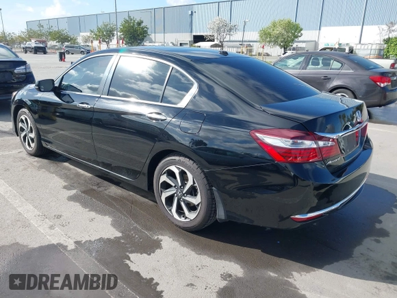 2016 Honda Accord Sedan EX with VIN 1HGCR2F71GA223298, listed as a IAAI auction lot 41976282 with 121,117 mi miles. Bid and sale history available at carsss.com. Image 3.