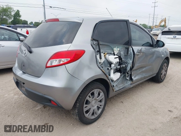 2013 Mazda 2 Sport z VIN JM1DE1KZ5D0164340, wystawiony jako IAAI lot #42280453 z przebiegiem 132 100 mil mil oraz . Historia ofert i sprzedaży dostępna na DreamBid. Obrazek 4.