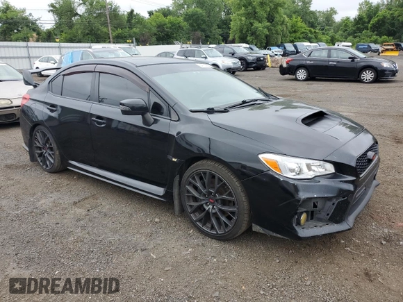 2017 Subaru WRX STI Limited with VIN JF1VA2Y60H9803265, listed as a Copart auction lot 64753225 with 129,768 mi miles and Salvage title. Bid and sale history available at DreamBid. Image 4.