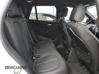 2019 BMW X1 xDrive28i with VIN WBXHT3C59K5L90317, listed as a Copart auction lot 61028125 with 46,789 mi miles and Salvage title. Bid and sale history available at DreamBid. Image 11.