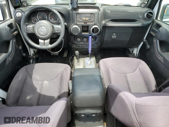 2013 Jeep Wrangler Unlimited Sport with VIN 1C4BJWDG8DL639781, listed as a Copart auction lot 63620025 with 84,720 mi miles and Salvage title. Bid and sale history available at DreamBid. Image 8.