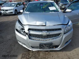 2013 Chevrolet Malibu ECO with VIN 1G11F5SR1DF338711, listed as a IAAI auction lot 41624193 with 152,815 mi miles. Bid and sale history available at carsss.com. Image 6.