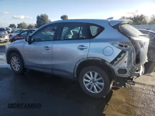 2016 Mazda CX-5 Sport with VIN JM3KE2BEXG0904597, listed as a Copart auction lot 86293834 with 63,343 mi miles and Salvage Title. Bid and sale history available at carsss.com. Image 2.