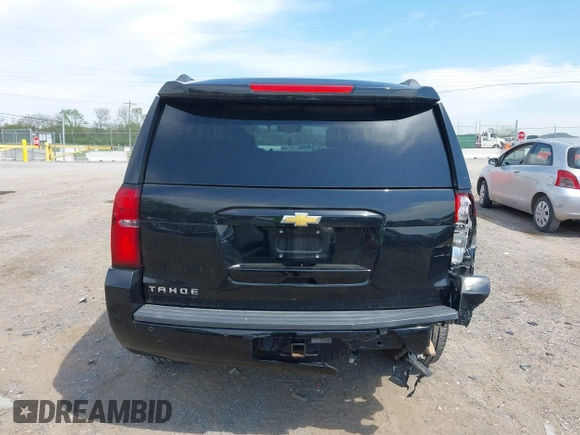 2015 Chevrolet Tahoe LT with VIN 1GNSCBKC9FR679748, listed as a IAAI auction lot 42018017 with 224,264 mi miles and . Bid and sale history available at DreamBid. Image 16.