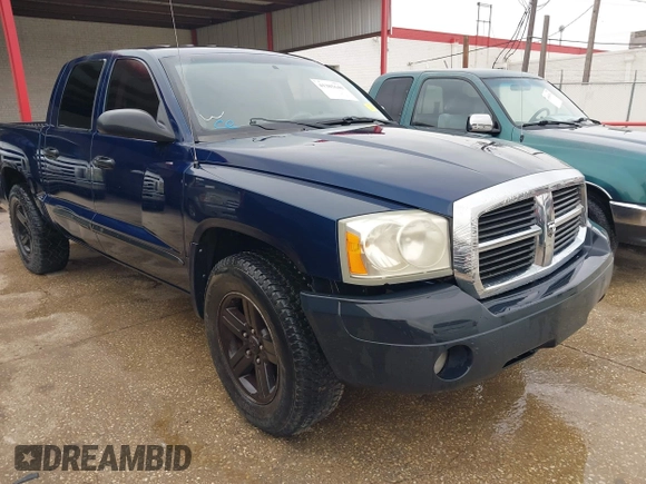 2007 Dodge Dakota SLT with VIN 1D7HE48K07S137252, listed as a IAAI auction lot 41385640 with 223,920 mi miles and . Bid and sale history available at carsss.com. Image 1.