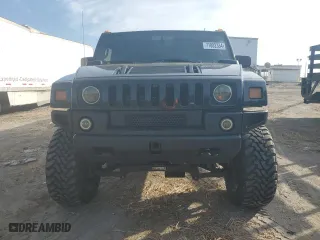 2005 Hummer H2 SUV with VIN 5GRGN23UX5H118848, listed as a Copart auction lot 71882334 with 147,976 mi miles and Clean Title. Bid and sale history available at carsss.com. Image 5.