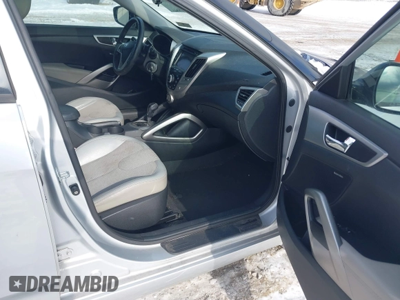 2012 Hyundai Veloster w/Gray Int with VIN KMHTC6AD3CU029042, listed as a IAAI auction lot 41416442 with 109,968 mi miles and . Bid and sale history available at DreamBid. Image 5.