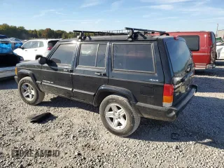 2001 Jeep Cherokee Sport z VIN 1J4FF58S61L612533, wystawiony jako Copart lot #76824714 z przebiegiem 62 401 mil mil oraz Szkoda całkowita • Salvage title. Historia ofert i sprzedaży dostępna na DreamBid. Obrazek 2.