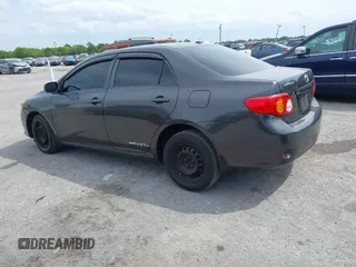 2010 Toyota Corolla with VIN 1NXBU4EE7AZ237289, listed as a IAAI auction lot 41877935 with 198,861 mi miles. Bid and sale history available at carsss.com. Image 13.