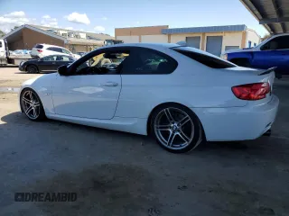 2011 BMW 3 Series 335is with VIN WBAKG1C53BE618465, listed as a Copart auction lot 51691555 with 135,296 mi miles and Salvage Title. Bid and sale history available at carsss.com. Image 2.