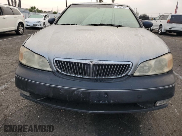 2004 Infiniti I35 z VIN JNKDA31A54T212810, wystawiony jako Copart lot #72467654 z przebiegiem 137 809 mil mil oraz Szkoda całkowita • Salvage title. Historia ofert i sprzedaży dostępna na DreamBid. Obrazek 5.
