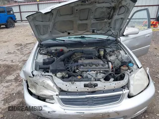 2000 Honda Civic VP z VIN 2HGEJ6613YH575630, wystawiony jako IAAI lot #41525214 z przebiegiem 251 481 mil mil oraz . Historia ofert i sprzedaży dostępna na DreamBid. Obrazek 10.