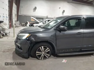 2016 Honda Pilot EX-L with VIN 5FNYF6H5XGB010230, listed as a IAAI auction lot 41858811 with 194,119 mi miles. Bid and sale history available at carsss.com. Image 6.