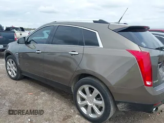 2014 Cadillac SRX Performance Collection with VIN 3GYFNCE31ES509461, listed as a IAAI auction lot 41908431 with 150,915 mi miles. Bid and sale history available at carsss.com. Image 3.