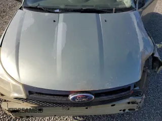 2008 Ford Focus SE z VIN 1FAHP33N08W189576, wystawiony jako Copart lot #54924705 z przebiegiem Nie podano mil oraz Szkoda całkowita • Salvage title. Historia ofert i sprzedaży dostępna na DreamBid. Obrazek 11.