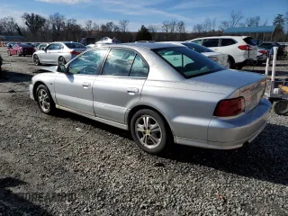 2002 Mitsubishi Galant ES z VIN 4A3AA46H42E060744, wystawiony jako Copart lot #37732694 z przebiegiem 173 507 mil mil oraz Szkody całkowita. Historia ofert i sprzedaży dostępna na DreamBid. Obrazek 2.