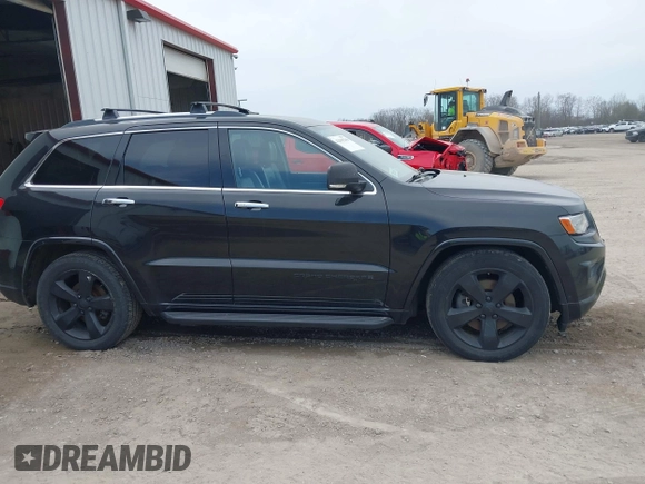 2014 Jeep Grand Cherokee Overland with VIN 1C4RJFCM8EC486259, listed as a IAAI auction lot 42105296 with 129,342 mi miles. Bid and sale history available at carsss.com. Image 13.