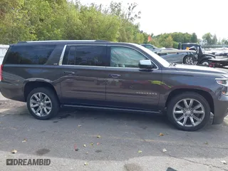 2015 Chevrolet Suburban LTZ with VIN 1GNSKKKC6FR243250, listed as a IAAI auction lot 40464836 with 120,030 mi miles. Bid and sale history available at carsss.com. Image 13.
