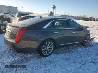 2014 Cadillac XTS with VIN 2G61L5S37E9185986, listed as a Copart auction lot 45142685 with 61,940 mi miles and Salvage Title. Bid and sale history available at carsss.com. Image 3.