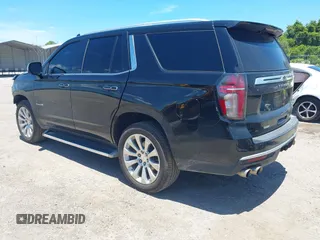 2021 Chevrolet Tahoe Premier with VIN 1GNSKSKDXMR195984, listed as a IAAI auction lot 42528305 with 89,925 mi miles and . Bid and sale history available at DreamBid. Image 3.