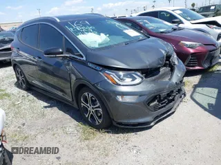 2021 Chevrolet Bolt EV Premier z VIN 1G1FZ6S01M4113902, wystawiony jako IAAI lot #41642702 z przebiegiem 33 026 mil mil oraz . Historia ofert i sprzedaży dostępna na DreamBid. Obrazek 1.