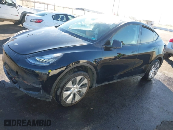2023 Tesla Model Y Long Range with VIN 7SAYGDEE8PA151965, listed as a IAAI auction lot 41343497 with 25,869 mi miles. Bid and sale history available at carsss.com. Image 22.