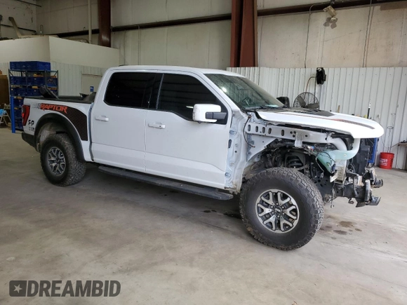 2023 Ford F-150 Raptor with VIN 1FTFW1RG5PFB97799, listed as a Copart auction lot 47471485 with 27,282 mi miles and Salvage Title. Bid and sale history available at DreamBid. Image 4.